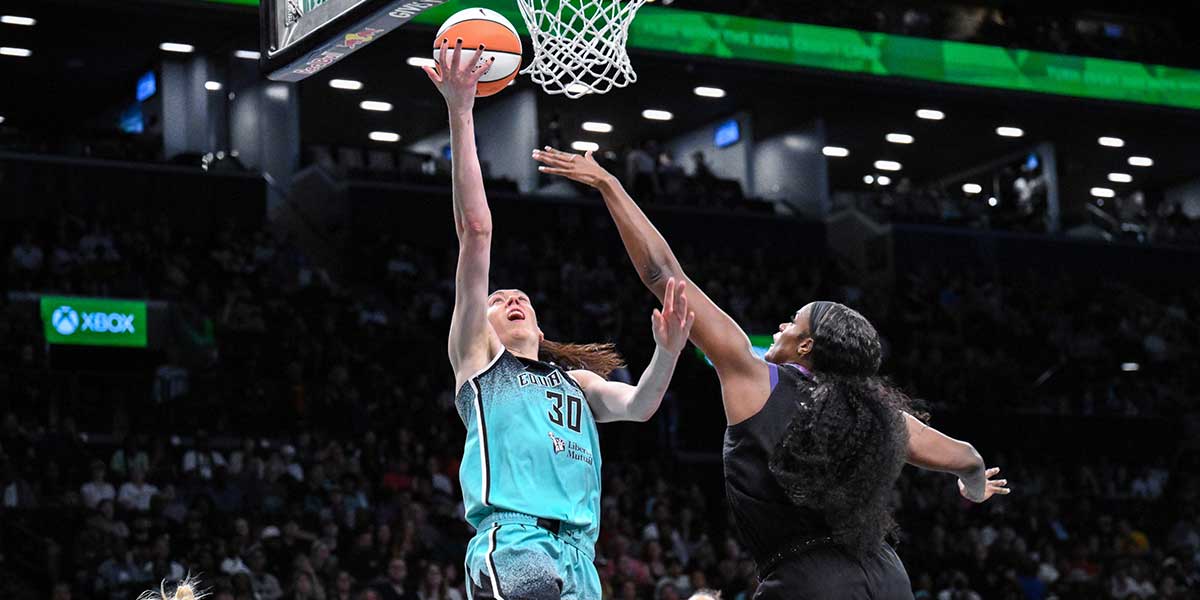 New York Liberty forward Breanna Stewart (30) shoots the ball while being defended by Phoenix Mercury center Kalani Brown (21) during the first half at Barclays Center.