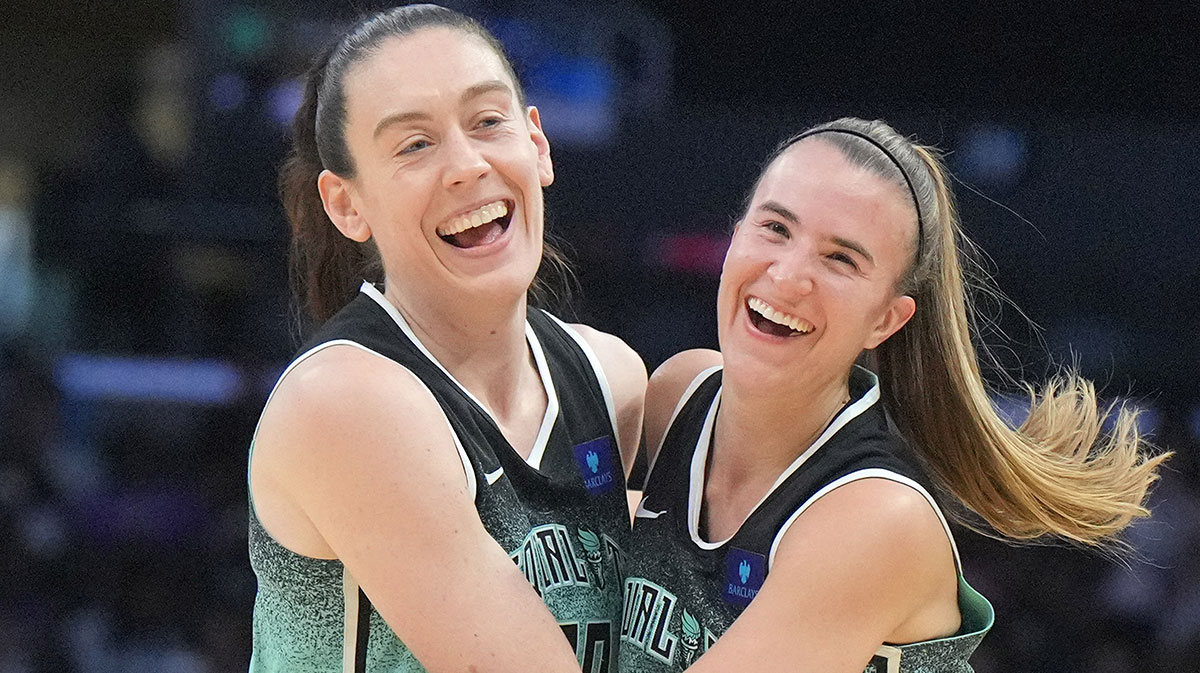 New York Liberty forward Breanna Stewart (30) and guard Sabrina Ionescu (20) celebrate in the first half against the LA Sparks Crypto.com Arena.