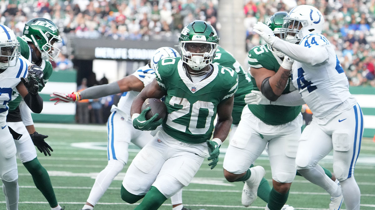 Nov 17, 2024; East Rutherford, New Jersey, USA; New York Jets running back Breece Hall (20) scores a touchdown against the Indianapolis Colts in the second half at MetLife Stadium. 