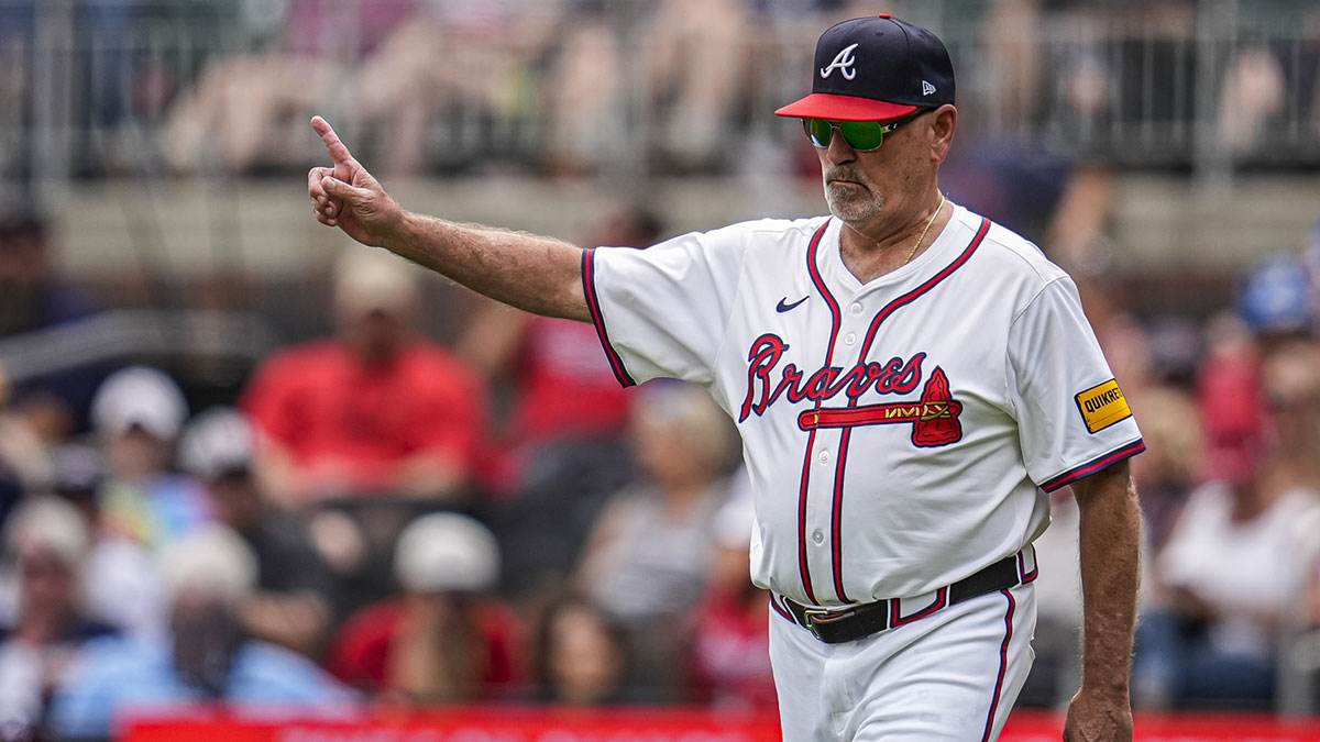 Atlanta Braves manager Brian Snitker (43) walks to the pitchers mound to change pitchers against the Arizona Diamondbacks during the ninth inning at Truist Park.