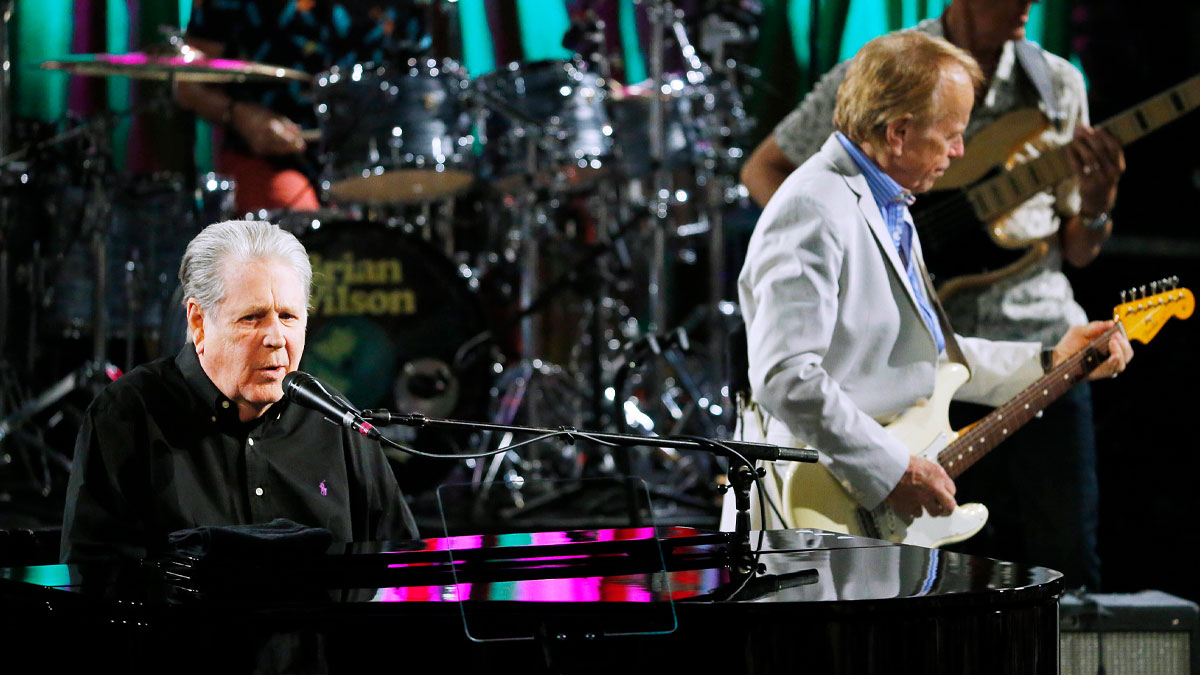 Brian Wilson, whose death garnered tributes from Bob Dylan, Paul McCartney, Ringo Starr, and more, and the Beach Boys performing in 2019.