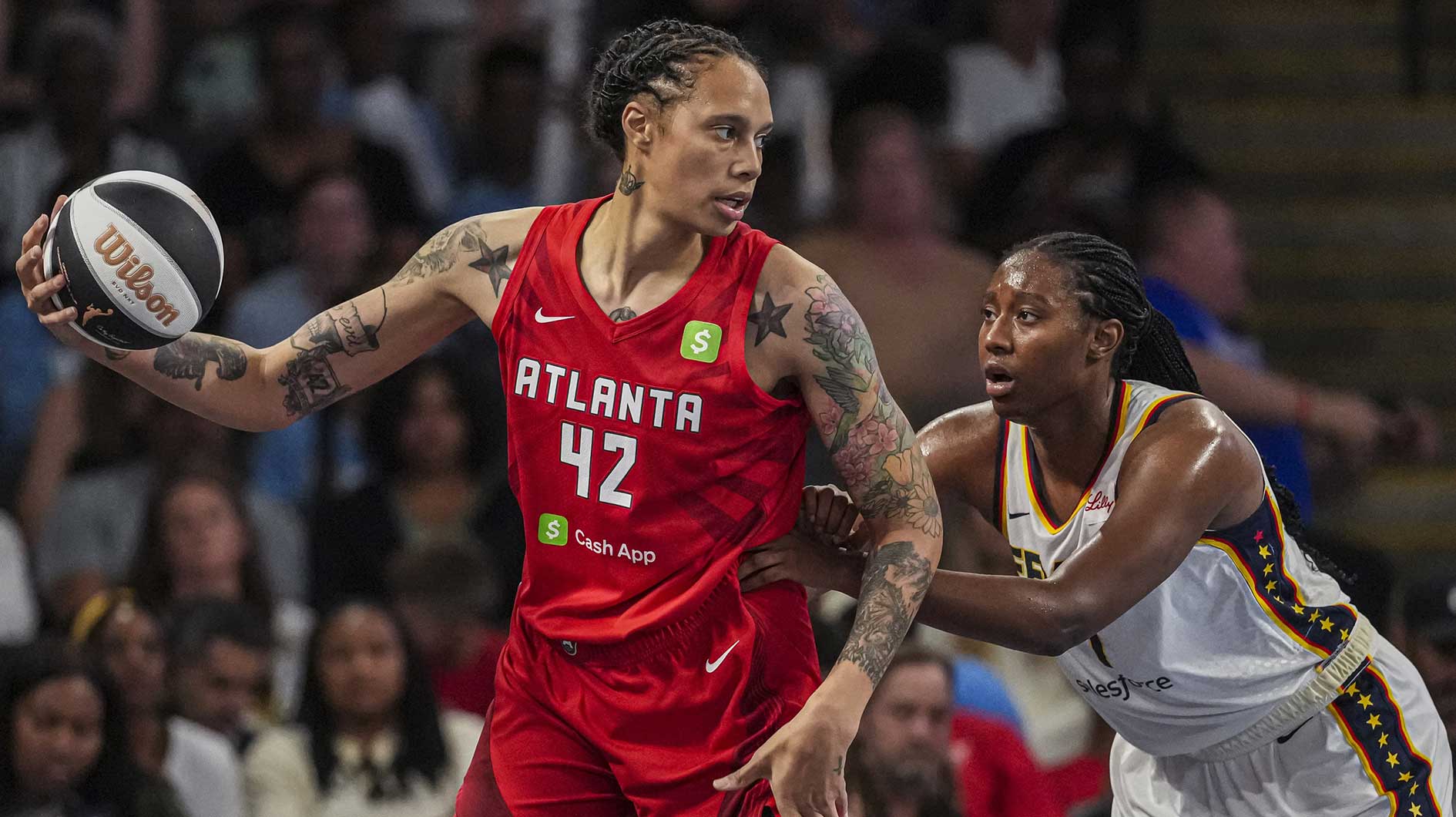 Atlanta Dream center Brittney Griner (42) is guarded by Indiana Fever forward Aliyah Boston (7) at Gateway Center Arena at College Park.