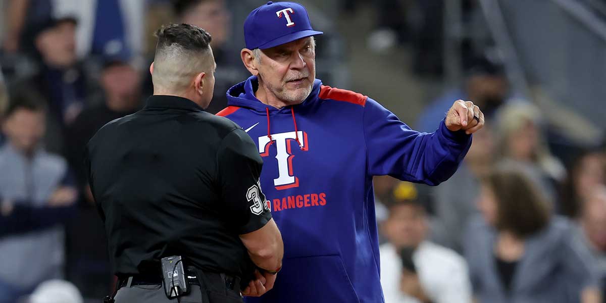 May 20, 2025; Bronx, New York, USA; Texas Rangers manager Bruce Bochy (15) argues with home plate umpire Carlos Torres (37) after being ejected during the sixth inning against the New York Yankees at Yankee Stadium.