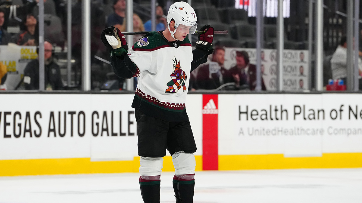 Sep 29, 2023; Las Vegas, Nevada, USA; Arizona Coyotes defenseman Victor Soderstrom (77) reacts after hitting a crossbar behind Vegas Golden Knights goaltender Logan Thompson (36) during the third period of a preseason game at T-Mobile Arena. Mandatory Credit: Stephen R. Sylvanie-Imagn Images
