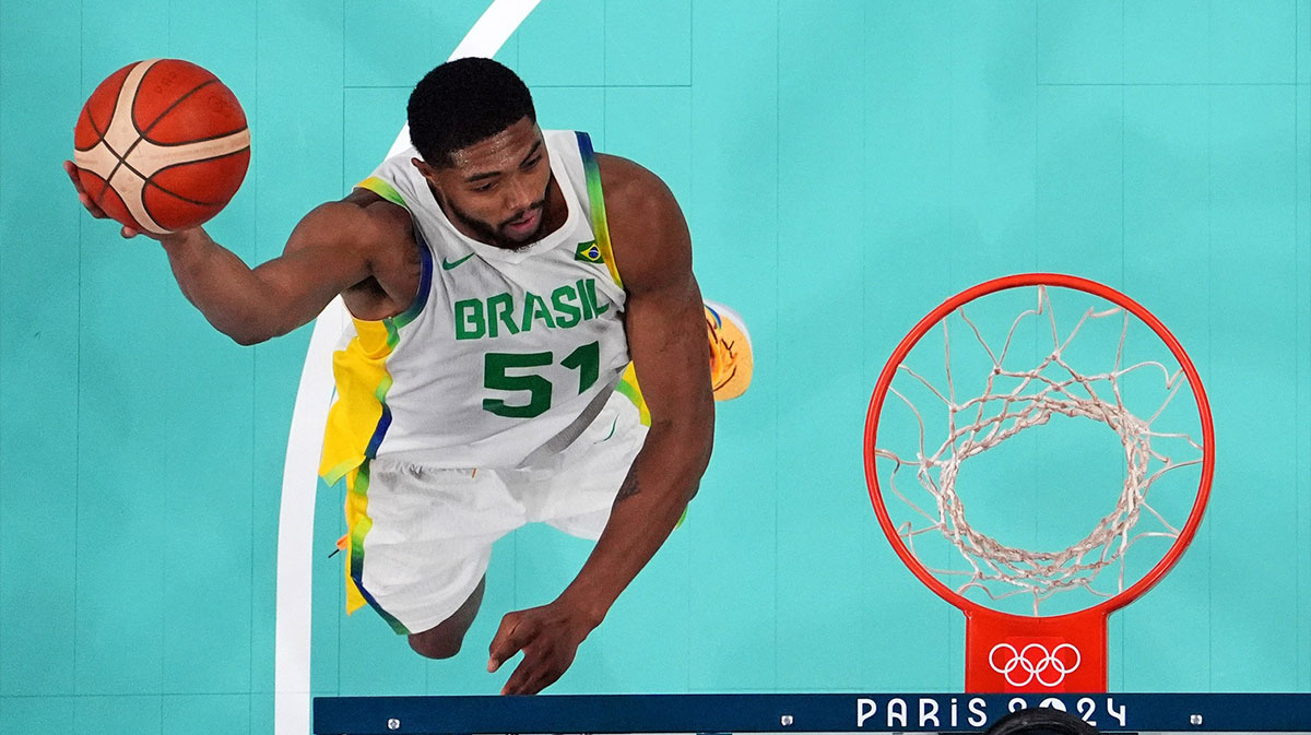Brazil power forward Bruno Caboclo (51) shoots the ball against Germany in men’s basketball group B play during the Paris 2024 Olympic Summer Games at Stade Pierre-Mauroy.