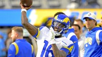 Los Angeles Rams quarterback Bryce Perkins (16) warms up prior to the game against the Los Angeles Chargers at SoFi Stadium.