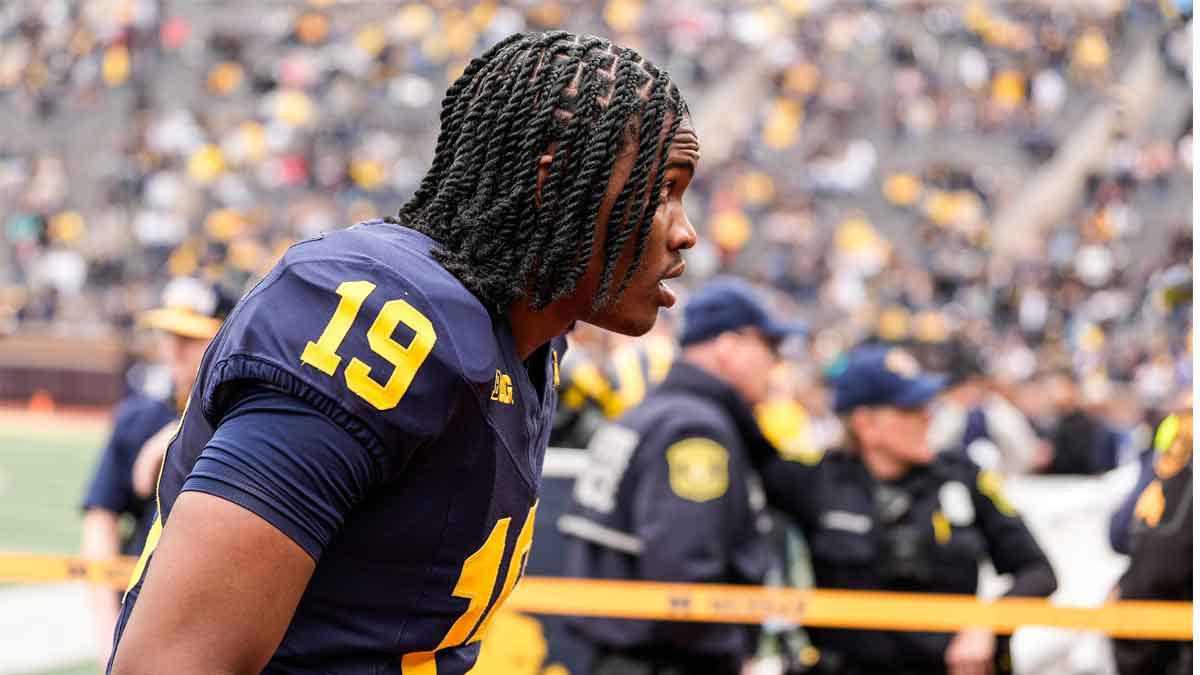 Michigan quarterback Bryce Underwood (19) walks up the tunnel after the first half of the spring game at Michigan Stadium