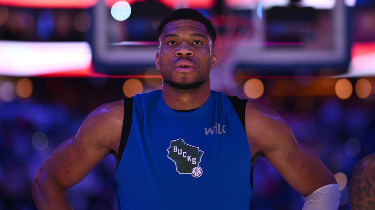 Milwaukee Bucks forward Giannis Antetokounmpo (34) observes the national anthem before the game against the Philadelphia 76ers at Wells Fargo Center.