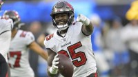 Tampa Bay Buccaneers cornerback Jamel Dean (35) celebrates after a fumble recovery in the second half against the Los Angeles Chargers at SoFi Stadium.