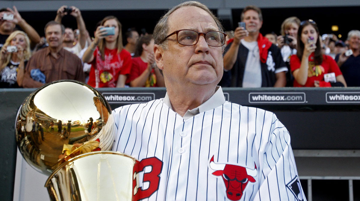 Chicago Bulls chairman Jerry Reinsdorf holds the NBA championship trophy before the game between the Chicago White Sox and New York Yankees at US Cellular Field.