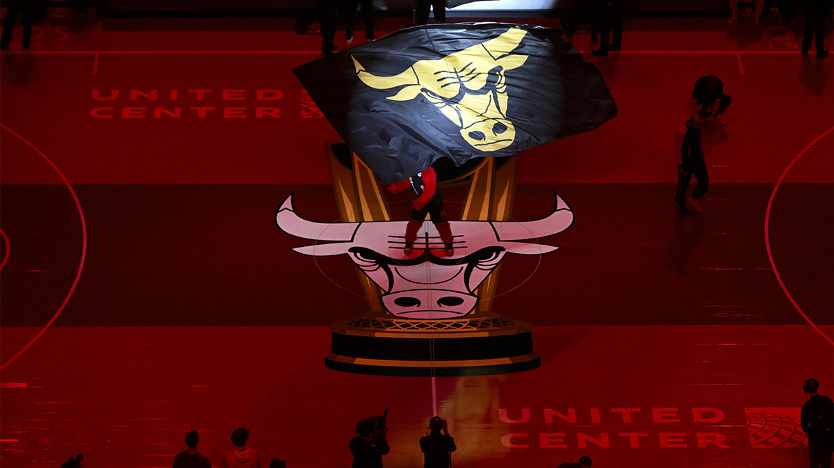 Benny the Bull waves a flag before the first half of the NBA In-Season Tournament game between the Chicago Bulls and the Brooklyn Nets at the United Center.