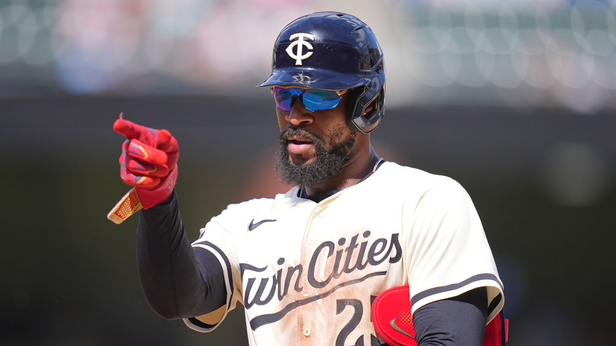 Jun 22, 2025; Minneapolis, Minnesota, USA; Minnesota Twins outfielder Byron Buxton (25) points to the dugout against the Milwaukee Brewers in the ninth inning at Target Field. Mandatory Credit: Brad Rempel-Imagn Images.