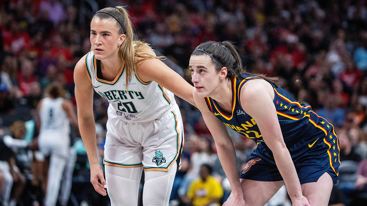 New York Liberty guard Sabrina Ionescu (20) and Indiana Fever guard Caitlin Clark (22) in the second half at Gainbridge Fieldhouse.