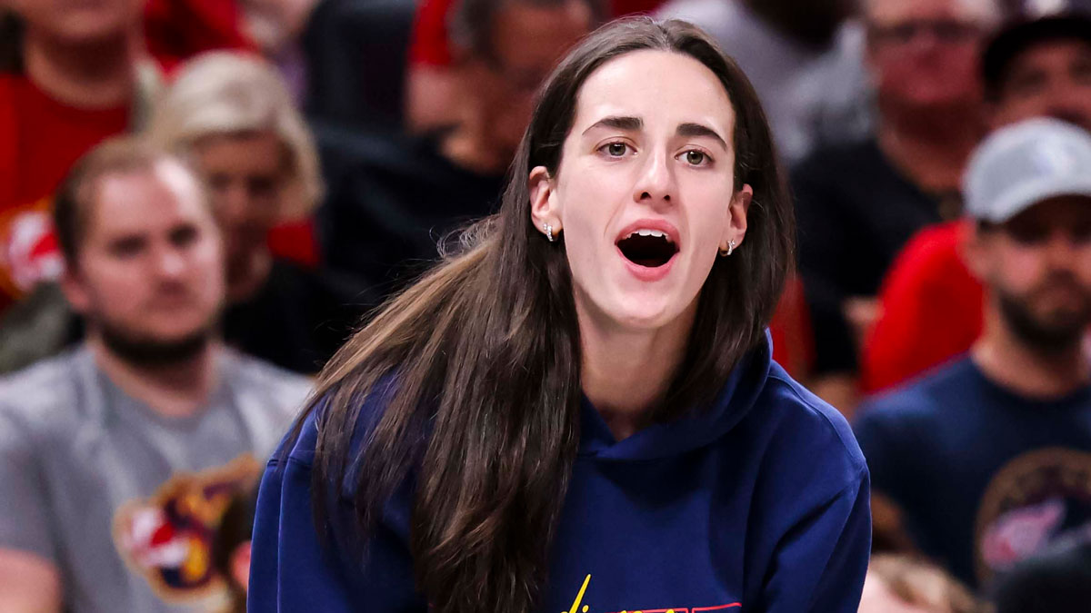 Indiana Fever guard Caitlin Clark (22) reacts to the action against the Los Angeles Sparks during the first half at Gainbridge Fieldhouse.