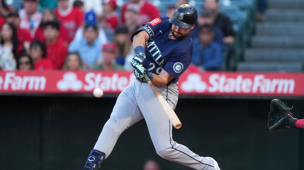 Jun 7, 2025; Anaheim, California, USA; Seattle Mariners catcher Cal Raleigh (29) hits a three-run home run in the first inning against the Los Angeles Angels at Angel Stadium.