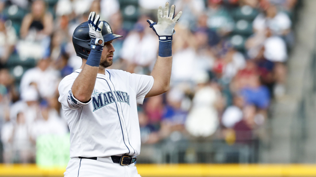 Seattle Mariners catcher Cal Raleigh (29) reacts towards the dugout after hitting a two-run double against the Boston Red Sox during the fourth inning at T-Mobile Park.
