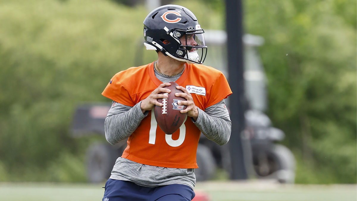 Chicago Bears quarterback Caleb Williams (18) looks to pass the ball during minicamp at Halas Hall.
