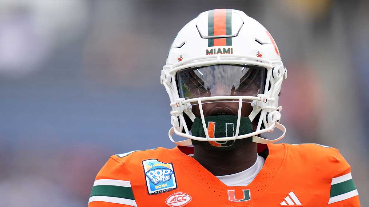 Miami Hurricanes quarterback Cam Ward (1) warms up prior to the game against the Iowa State Cyclones at Camping World Stadium.