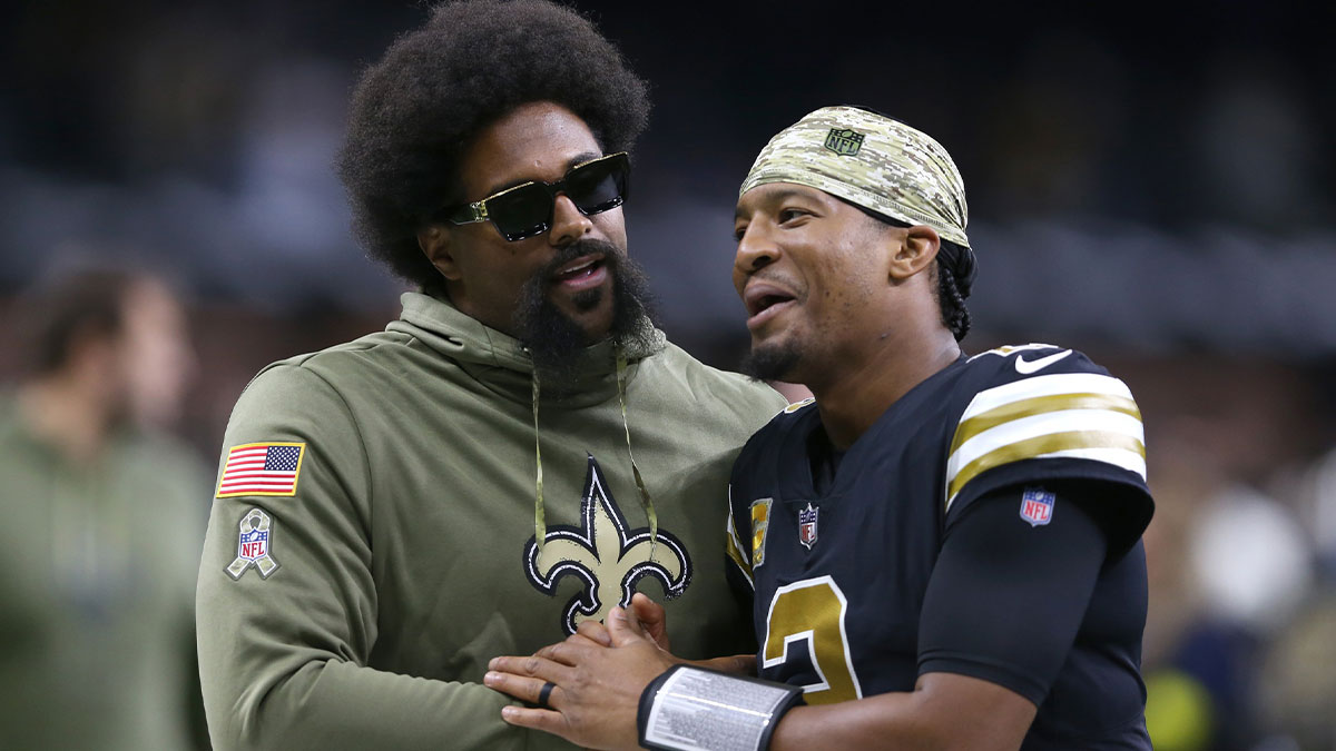 Injured New Orleans Saints defensive end Cameron Jordan walks off the field with quarterback Jameis Winston (2) at the end of their game against the Los Angeles Rams at the Caesars Superdome.