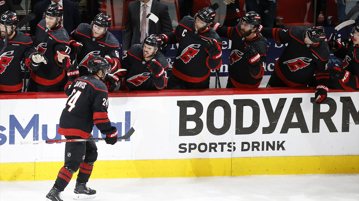 Carolina Hurricanes forward Seth Jarvis (24) celebrates scoring with players on the bench during the third period against the Carolina Hurricanes in game five of the Eastern Conference Final of the 2025 Stanley Cup Playoffs at Lenovo Center