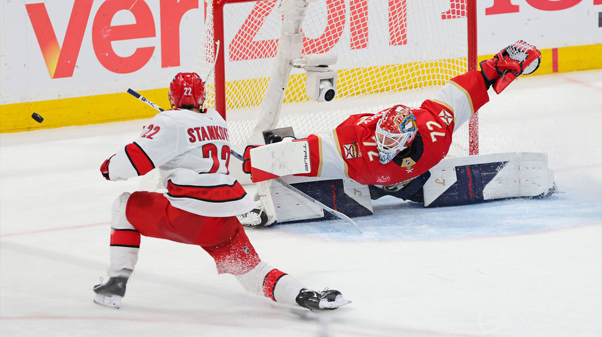 Carolina Hurricanes center Logan Stankoven (22) takes a shot on goal as Florida Panthers goaltender Sergei Bobrovsky (72) makes a save during the second period in game three of the Eastern Conference Final of the 2025 Stanley Cup Playoffs at Amerant Bank Arena.