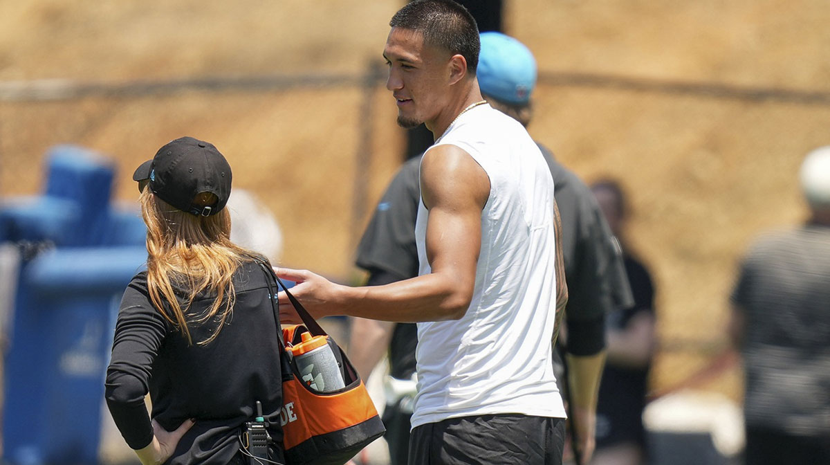 Carolina Panthers wide receiver Tetairoa McMillan (4) gets a drink during minicamp at Bank of America Stadium.