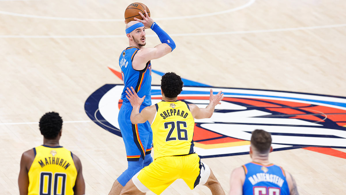Oklahoma City Thunder guard Alex Caruso (9) looks to pass while Indiana Pacers guard Ben Sheppard (26) defends during the first half of game seven of the 2025 NBA Finals at Paycom Center.