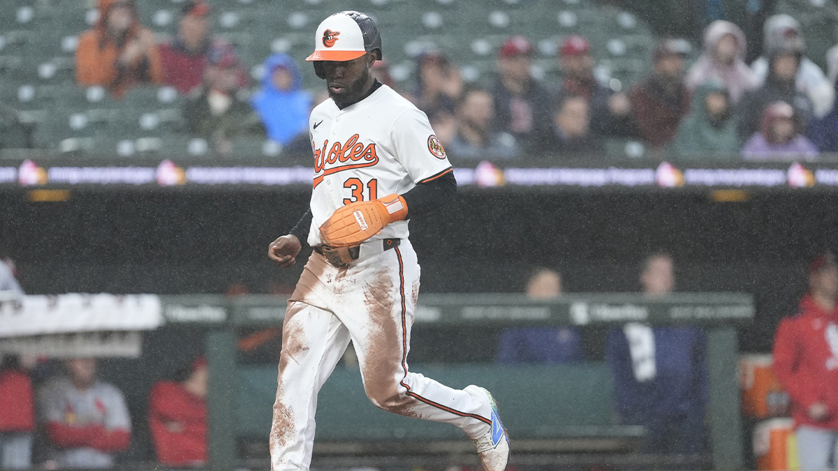 Baltimore Orioles center fielder Cedric Mullins (31) scores a run on Baltimore Orioles second baseman Jackson Holliday (7) (not pictured) RBI double against the St. Louis Cardinals during the second inning at Oriole Park at Camden Yards