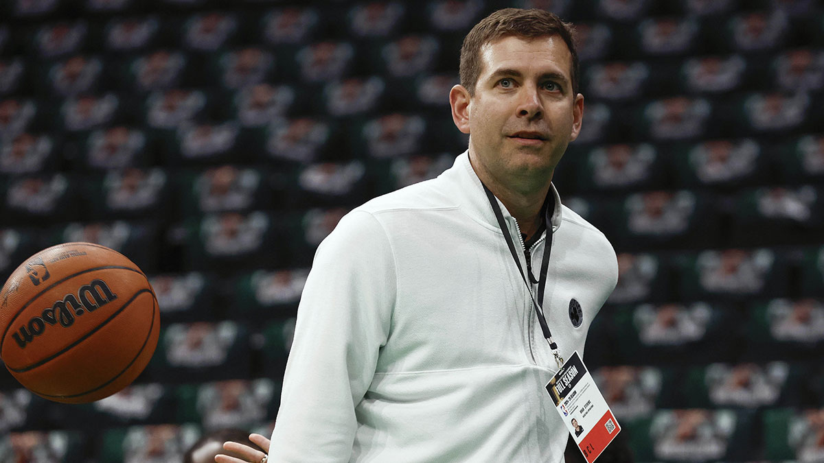 Boston Celtics president of basketball operations Brad Stevens throws a behind the back pass to one of his players before their game against the Cleveland Cavaliers at TD Garden.