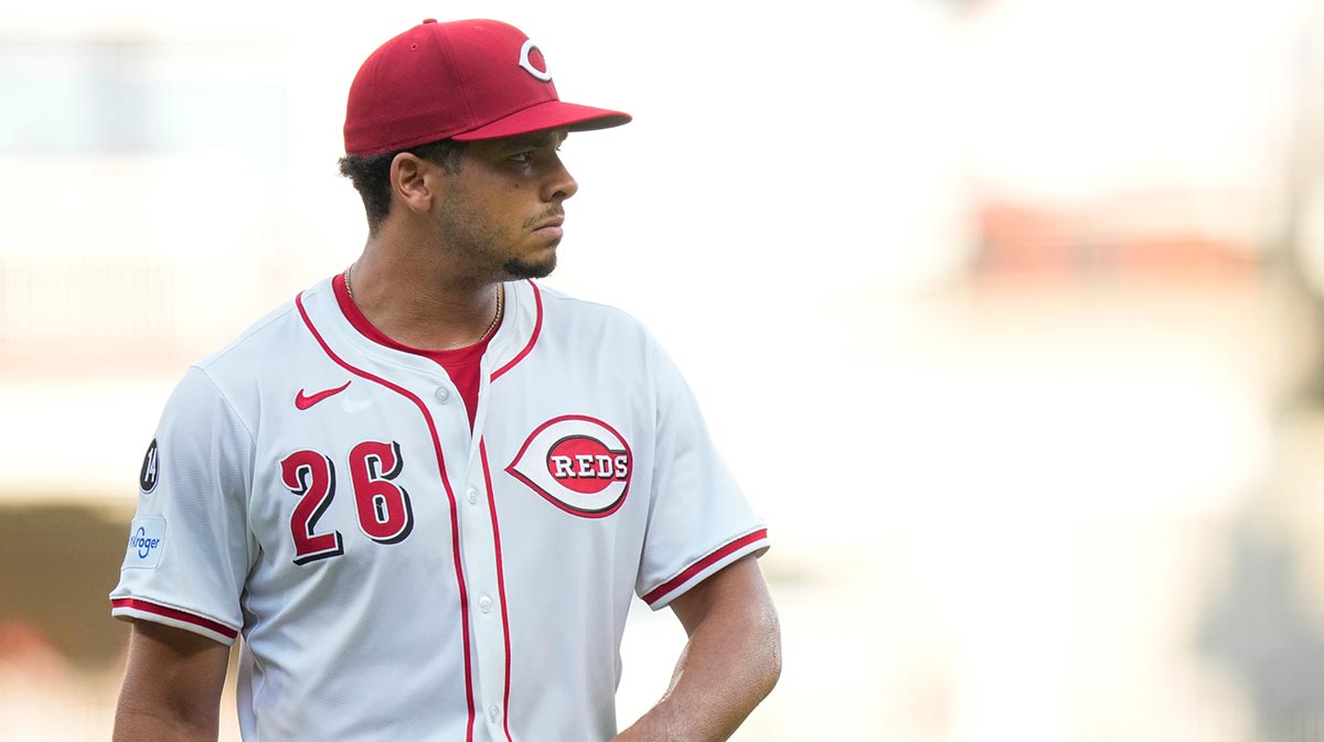 Cincinnati Reds pitcher Chase Burns (26) returns to the dugout after striking out the side in his MLB debut in the first inning of the MLB interleague game between the Cincinnati Reds and the New York Yankees at Great American Ball Park.