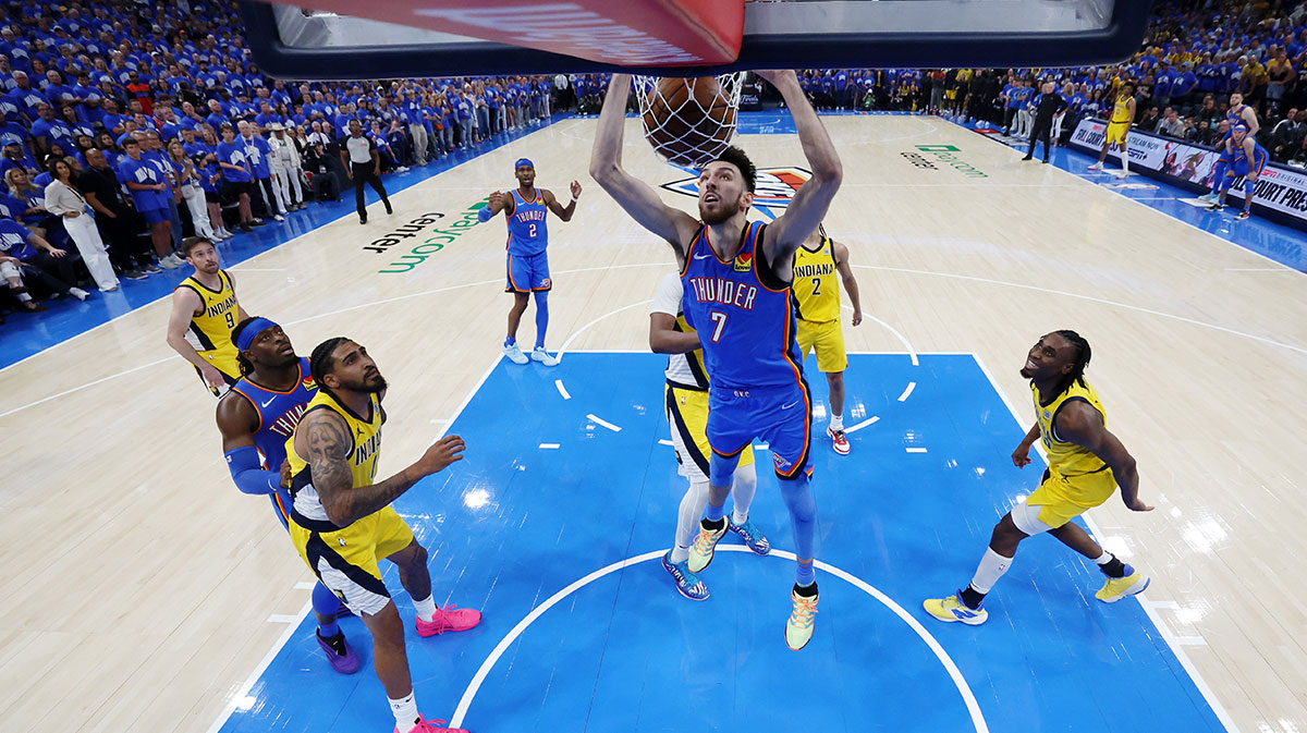 Oklahoma City Thunder forward Chet Holmgren (7) dunks against the Indiana Pacers during the second half during game seven of the 2025 NBA Finals at Paycom Center.