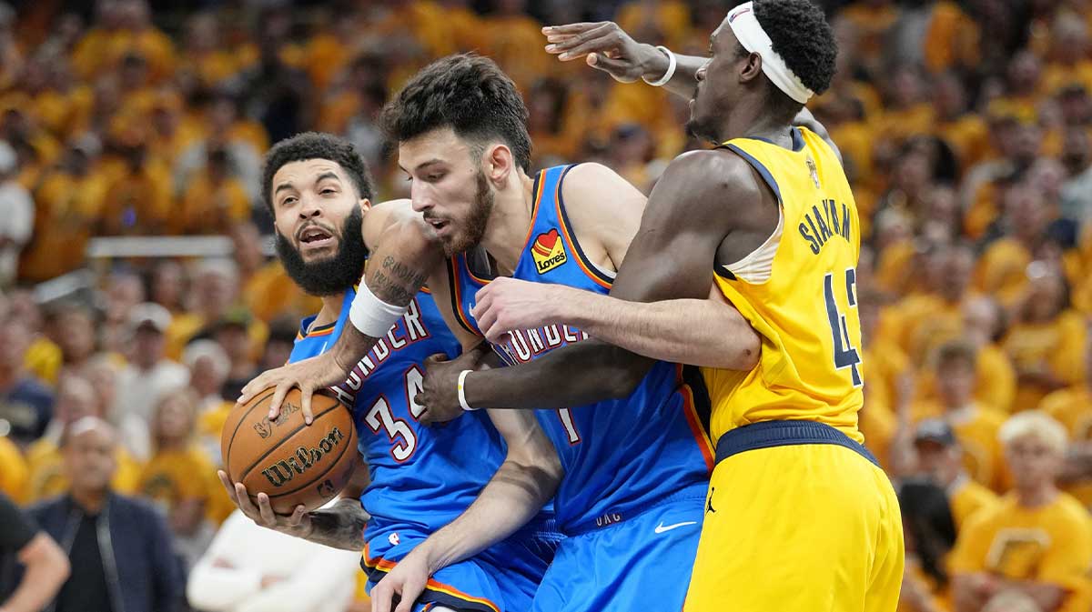 Oklahoma City Thunder forward Kenrich Williams (34) collides with forward Chet Holmgren (7) as Indiana Pacers forward Pascal Siakam (43) defends during the second half during game four of the 2025 NBA Finals at Gainbridge Fieldhouse.