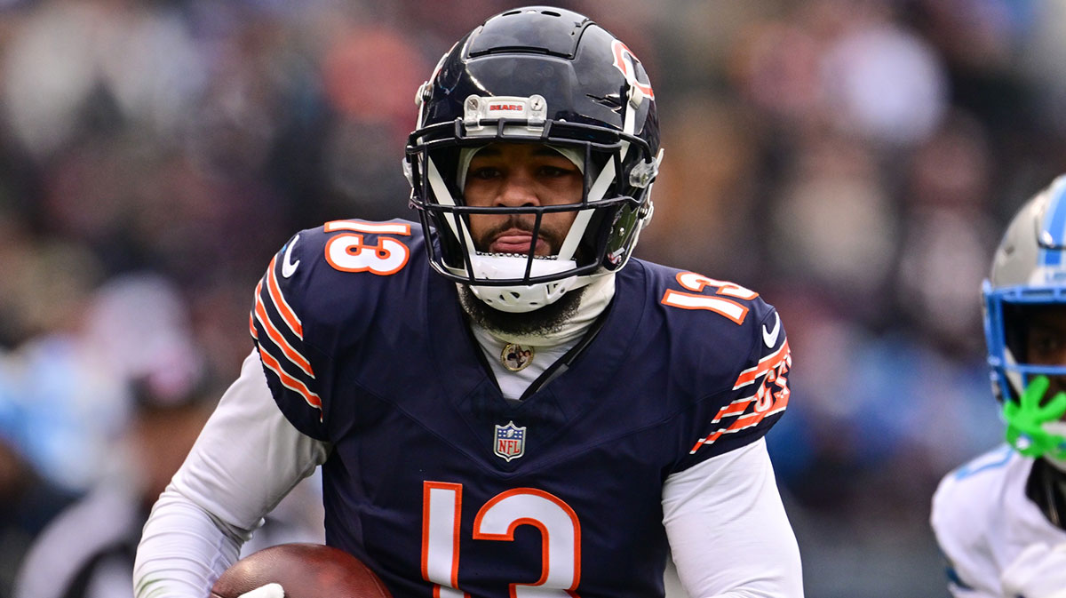 Chicago Bears wide receiver Keenan Allen (13) runs after a catch against the Detroit Lions during the second quarter at Soldier Field.