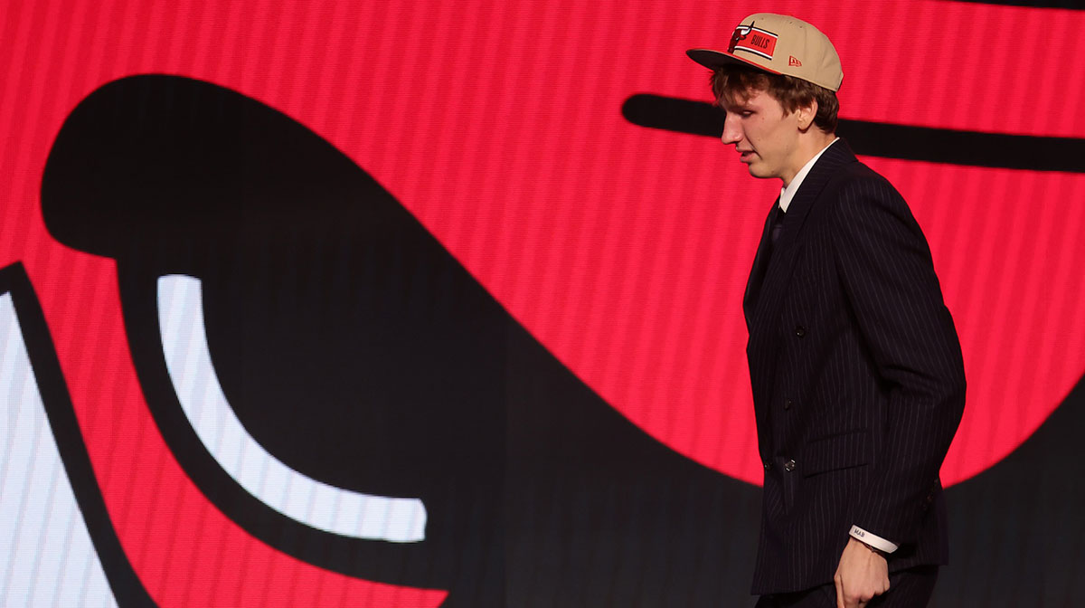 Matas Buzelis walks on stage after being selected in the first round by the Chicago Bulls in the 2024 NBA Draft at Barclays Center.