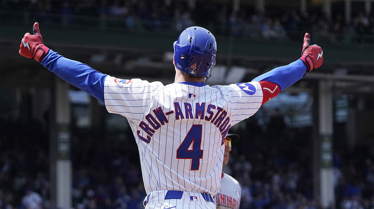 Chicago Cubs outfielder Pete Crow-Armstrong (4) gestures after hitting a one run single against the Cincinnati Reds during the third inning at Wrigley Field.