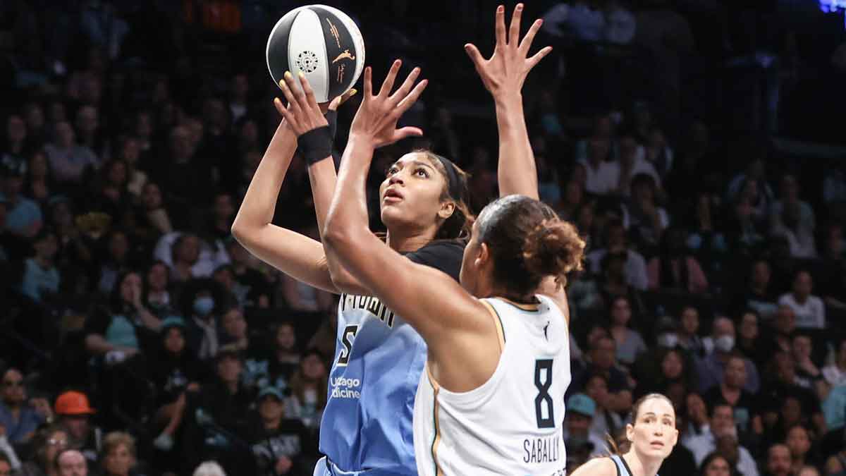 Chicago Sky forward Angel Reese (5) drives past New York Liberty center Nyara Sabally (8) in the first quarter at Barclays Center.