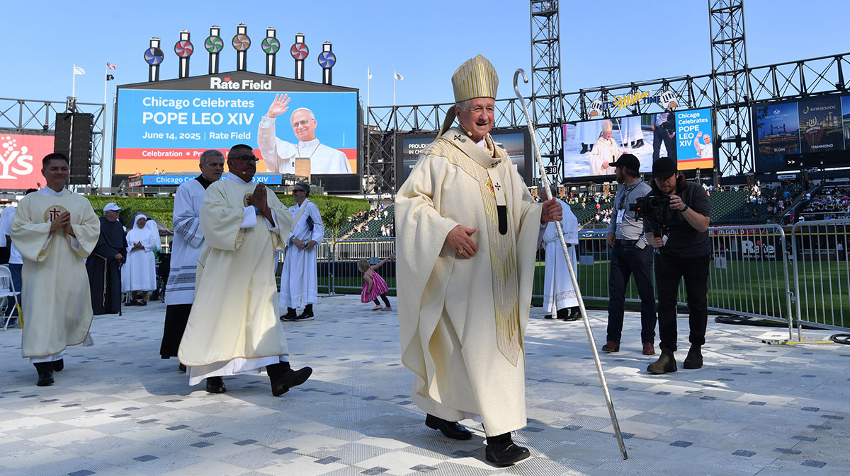Cardinal Blase J. Cupich, Archbishop of Chicago, walks off the field during the Archdiocese of Chicago’s Catholic mass as it concludes at Rate Field, home of the Chicago White Sox.