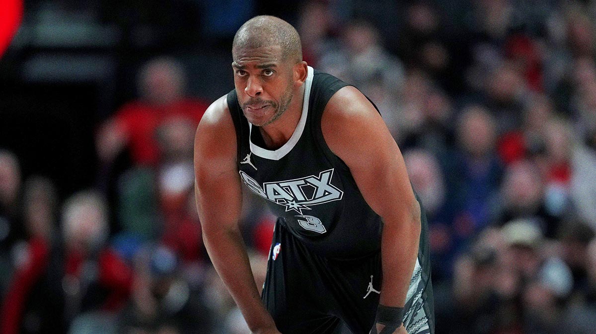 San Antonio Spurs point guard Chris Paul (3) looks on during the first half against the Portland Trail Blazers at Moda Center.