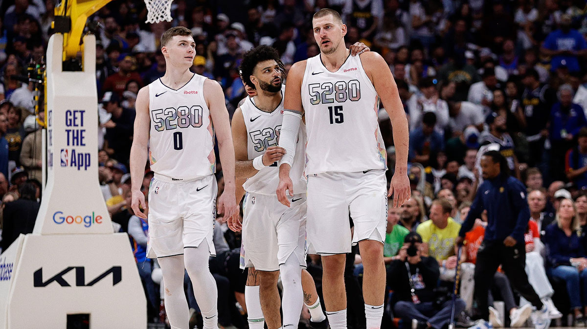 Denver Nuggets guard Jamal Murray (27) and center Nikola Jokic (15) and guard Christian Braun (0) in the fourth quarter against the Oklahoma City Thunder during game six of the second round.