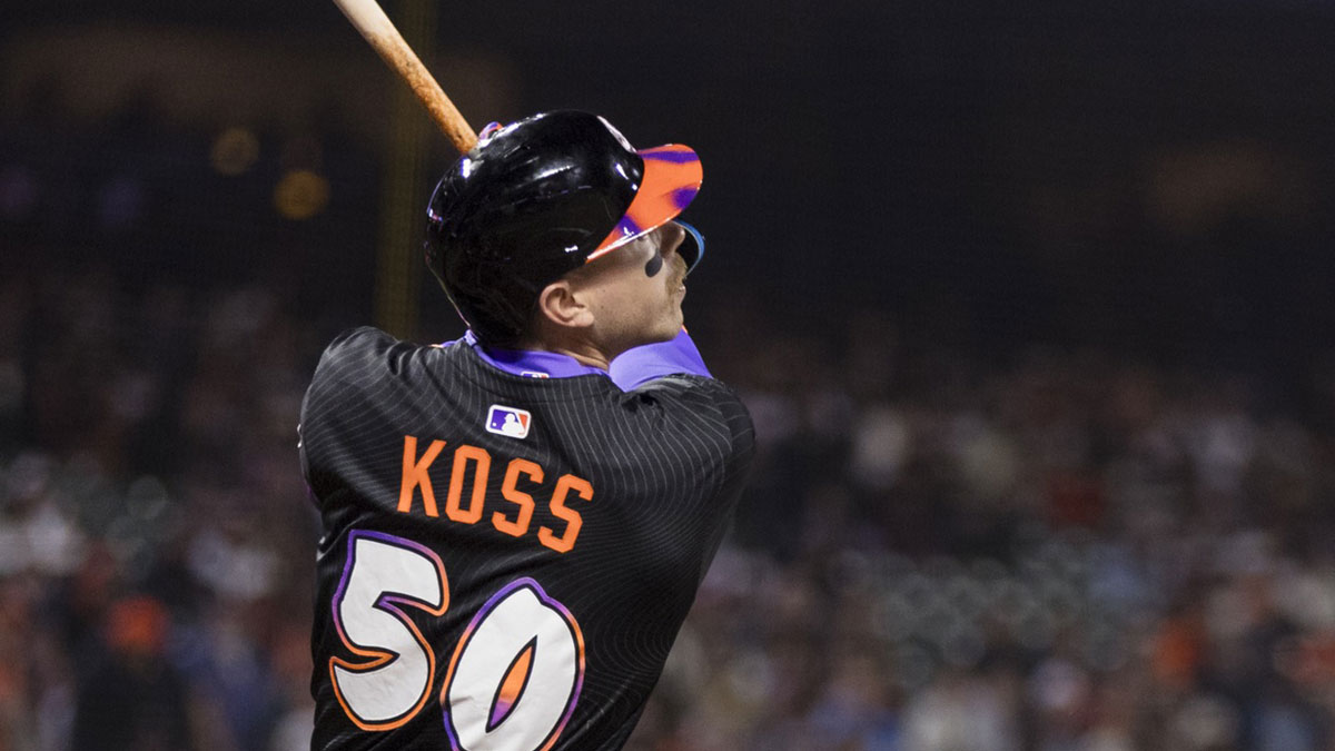 San Francisco Giants second baseman Christian Koss (50) hits a single against the Arizona Diamondbacks during the fifth inning at Oracle Park.