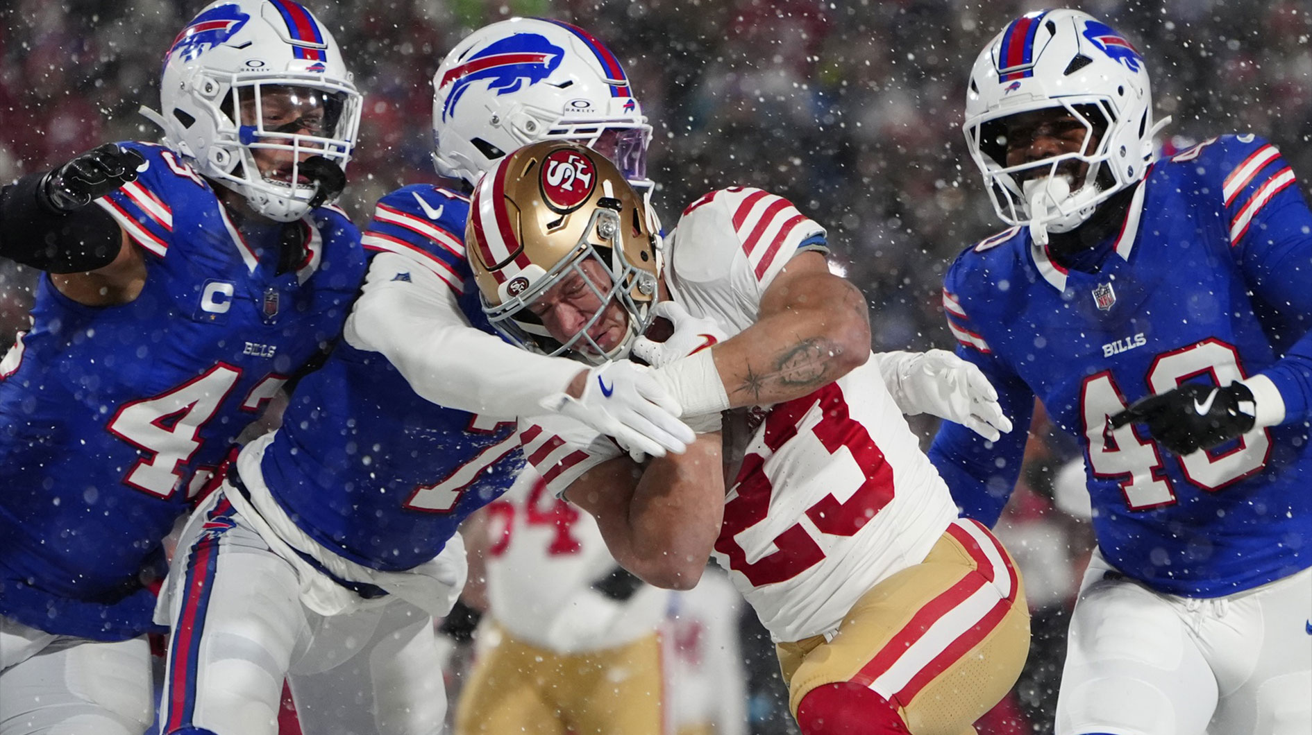 San Francisco 49ers running back Christian McCaffrey (23) runs with the ball against Buffalo Bills cornerback Taron Johnson (7)during the first half at Highmark Stadium.