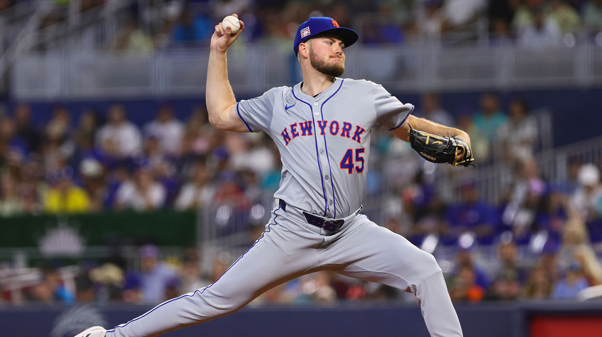 New York Mets starting pitcher Christian Scott (45) delivers a pitch against the Miami Marlins during the first inning at loanDepot Park.