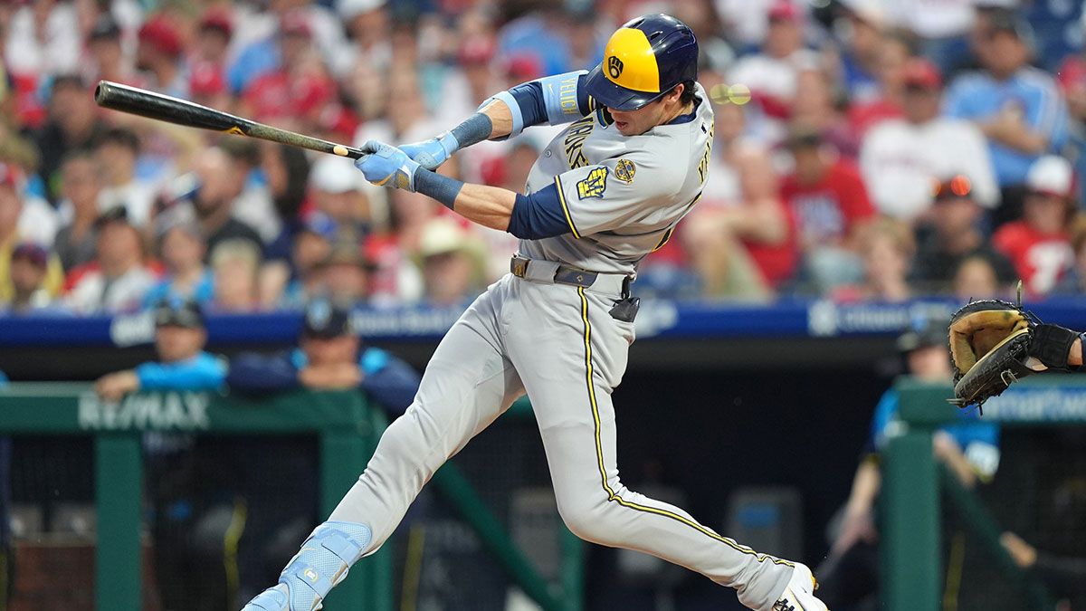 May 30, 2025; Philadelphia, Pennsylvania, USA; Milwaukee Brewers outfielder Christian Yelich (22) hits a single against the Philadelphia Phillies in the third inning at Citizens Bank Park.