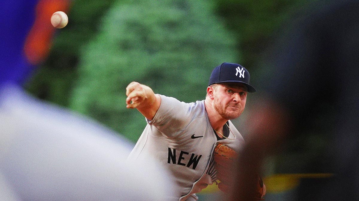 May 23, 2025; Denver, Colorado, USA; New York Yankees starting pitcher Clarke Schmidt (36) delivers a pitch in the first inning against the Colorado Rockies at Coors Field. Mandatory Credit: Ron Chenoy-Imagn Images