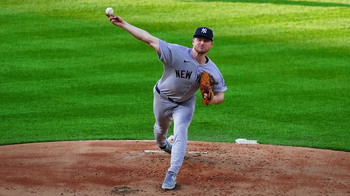 May 23, 2025; Denver, Colorado, USA; New York Yankees starting pitcher Clarke Schmidt (36) delivers a pitch in the first inning against the Colorado Rockies at Coors Field.