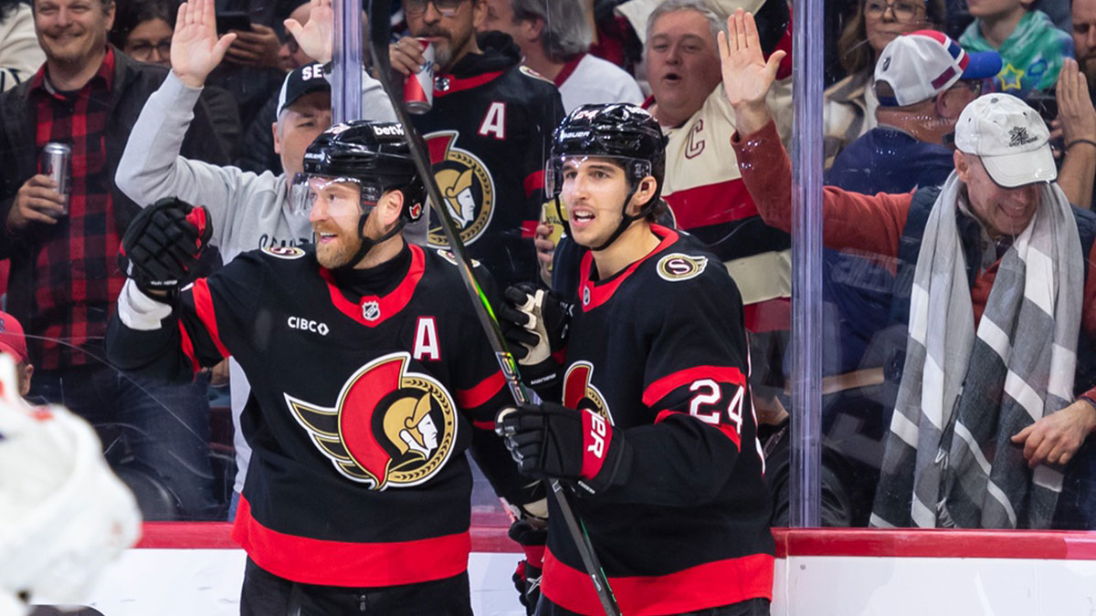 Ottawa Senators right wing Claude Giroux (28) celebrates a goal scored by center Dylan Cozens (24) in the first period against the Montreal Canadiens at the Canadian Tire Centre.