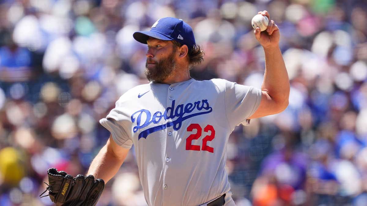 Los Angeles Dodgers starting pitcher Clayton Kershaw (22) delivers a pitch in the sixth inning against the Colorado Rockies at Coors Field.