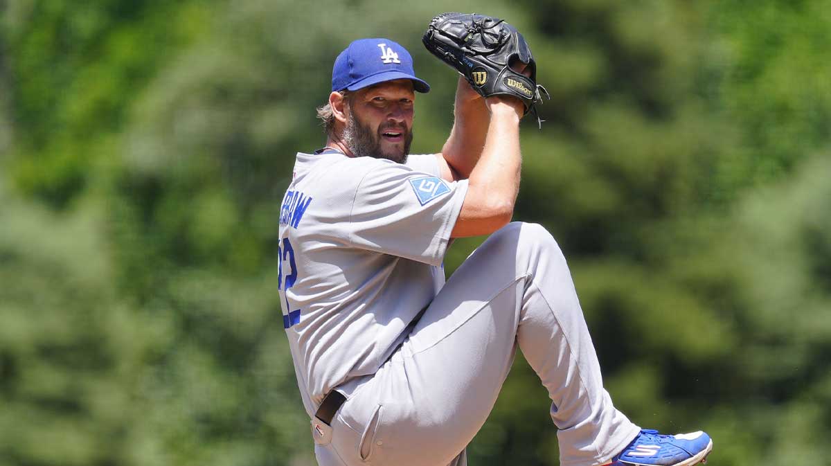 Los Angeles Dodgers starting pitcher Clayton Kershaw (22) prepares to deliver a pitch in the first inning against the Colorado Rockies at Coors Fields.