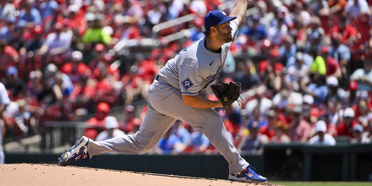 Los Angeles Dodgers starting pitcher Clayton Kershaw (22) pitches against the St. Louis Cardinals during the first inning at Busch Stadium.
