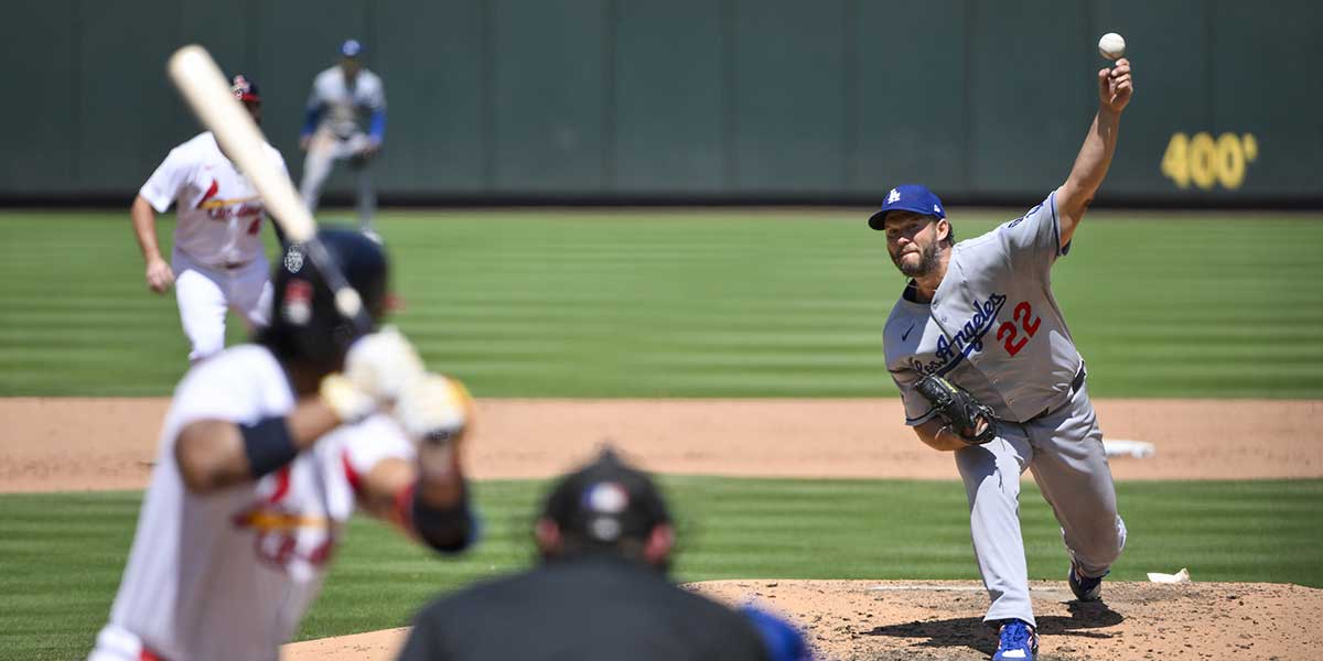 Los Angeles Dodgers starting pitcher Clayton Kershaw (22) pitches against St. Louis Cardinals center fielder Jose Barrero (27) during the fifth inning at Busch Stadium.